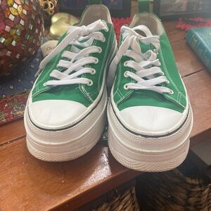 These are cute Kelley green sneakers size 11 but will fit a size 10 also.